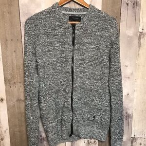 Religion zip up sweater large